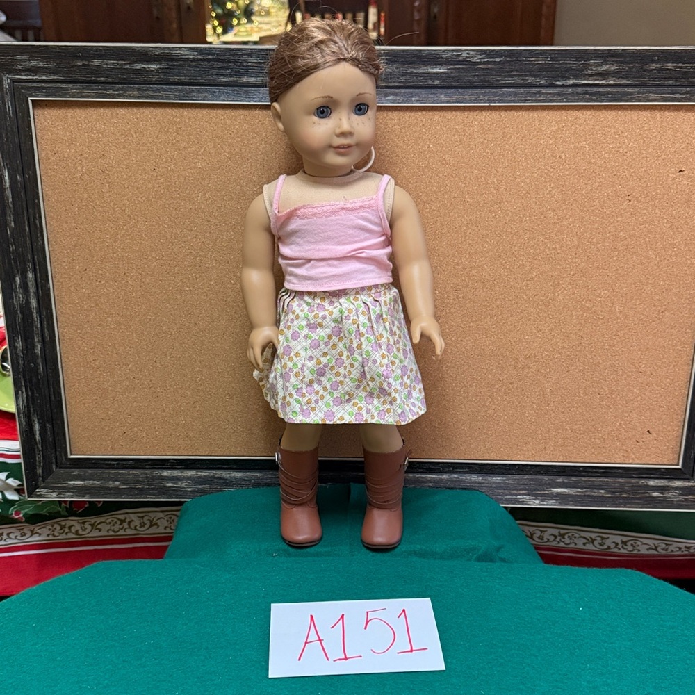 American Girl Doll in Pink Top and Floral Skirt with Brown Boots